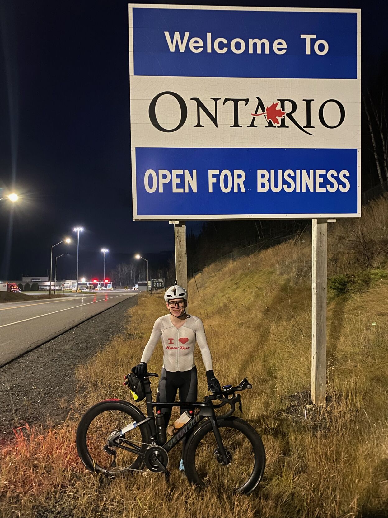 Chase Wark at the Welcome to Ontario, Canada sign